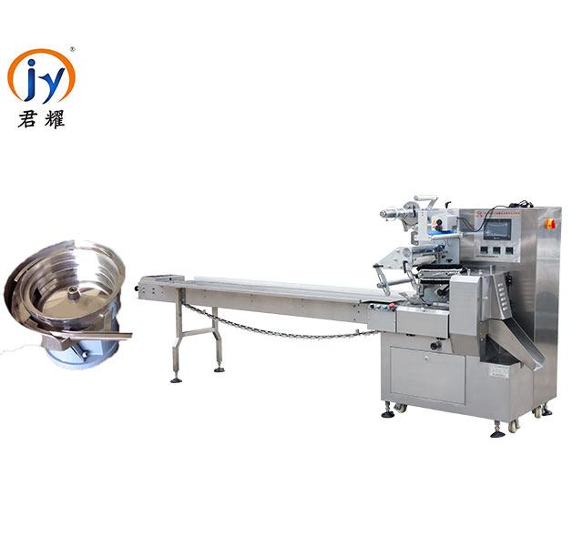 Automatic feeding plate pillow packing machine